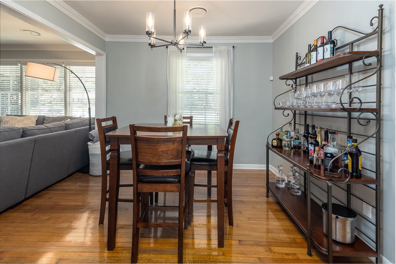 4983 Dee Road Memphis, TN 38117 - Photo 5 of 25 a view of a dining room with furniture window and wooden floor