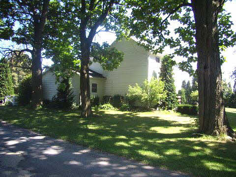 12233 Beaverton Road Poplar Grove, IL 61065 - Photo 5 of 6 a backyard of a house with yard and tree