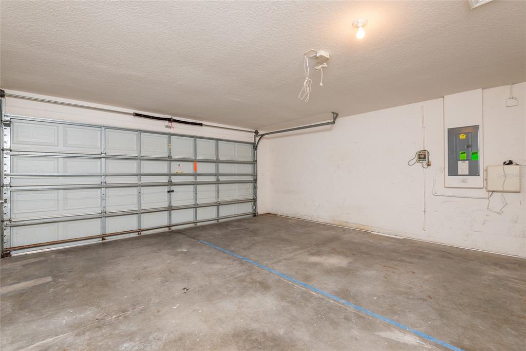 11813 Prickly Pear Way Seffner, FL 33584 - Photo 22 of 24 a view of a garage