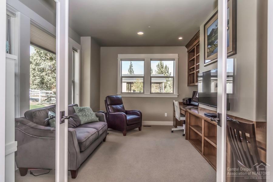 63528 Old Deschutes Road Bend, OR 97701 - Photo 3 of 25 a living room with furniture and a window