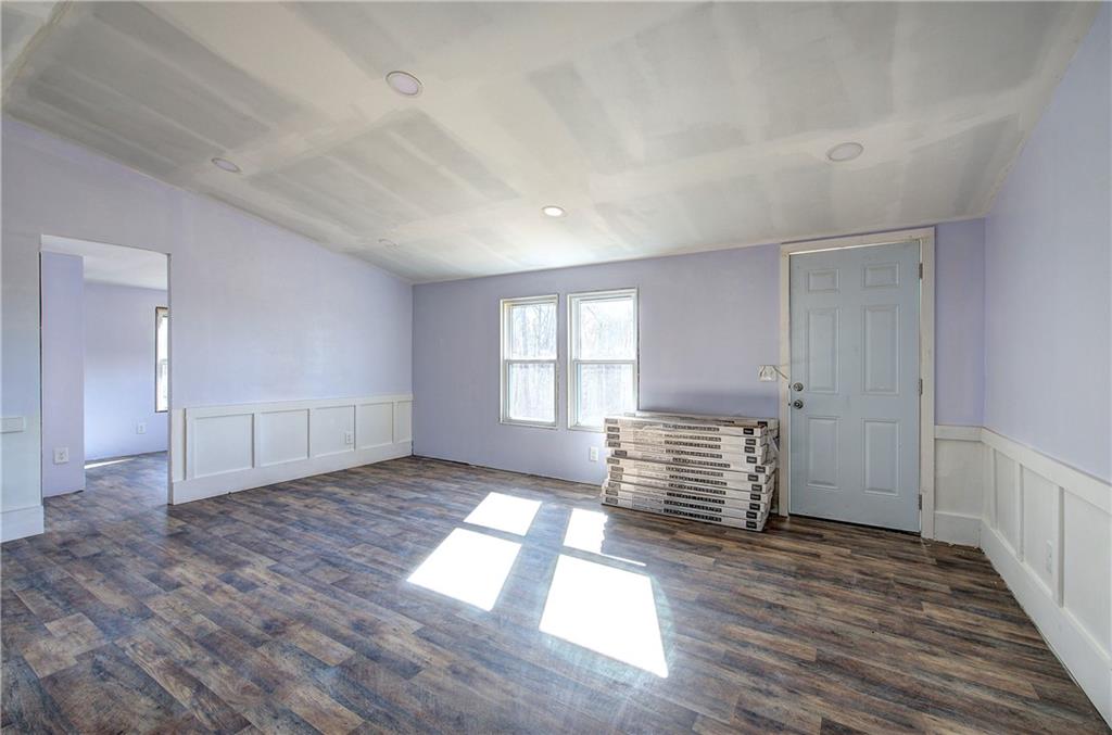 676 Flowery Branch Road Kingston, GA 30145 - Photo 28 of 96 wooden floor in an empty room with a window