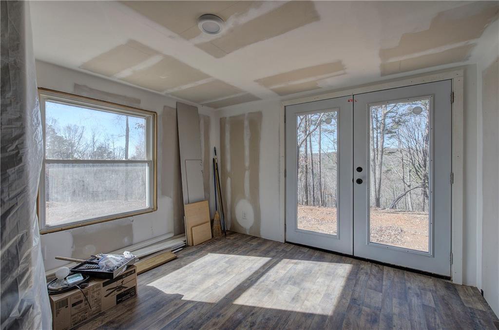 676 Flowery Branch Road Kingston, GA 30145 - Photo 36 of 96 a view of livingroom with furniture and windows