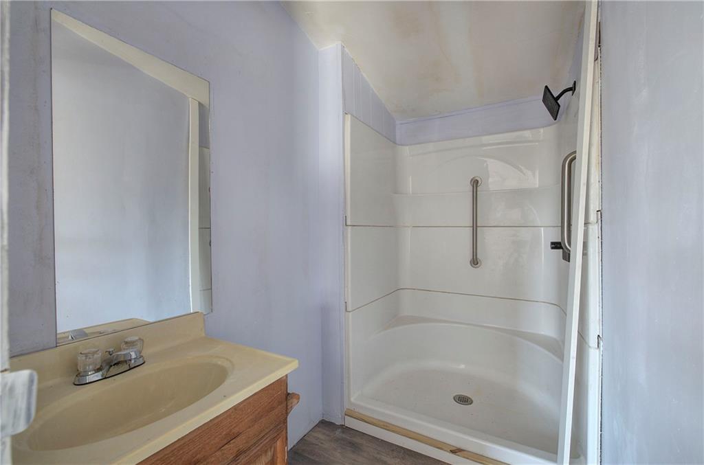 676 Flowery Branch Road Kingston, GA 30145 - Photo 45 of 96 a bathroom with a tub and shower