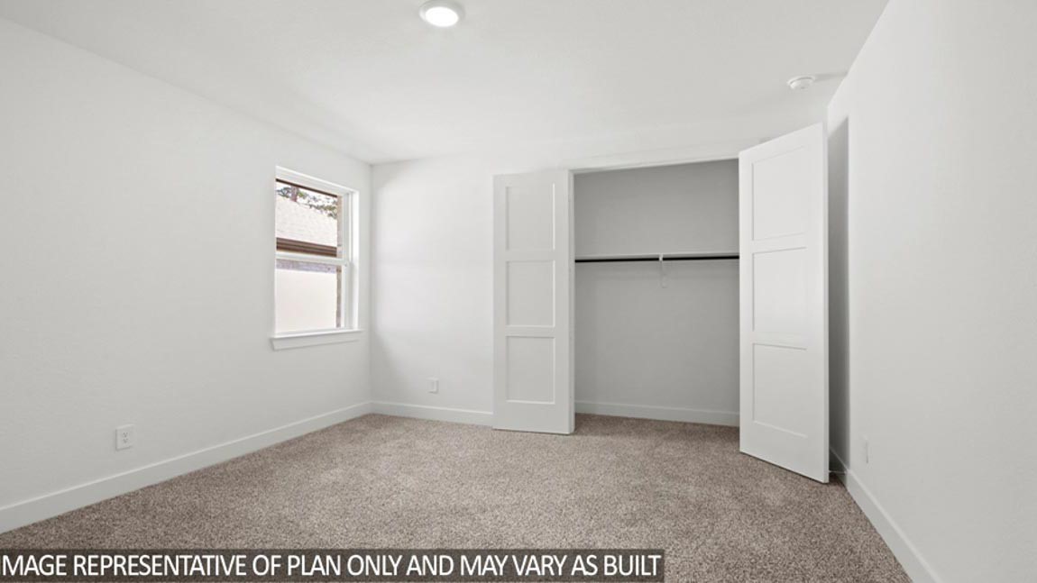 15219 Riverside Drive Baytown, TX 77523 - Photo 9 of 14 a view of an empty room with a window