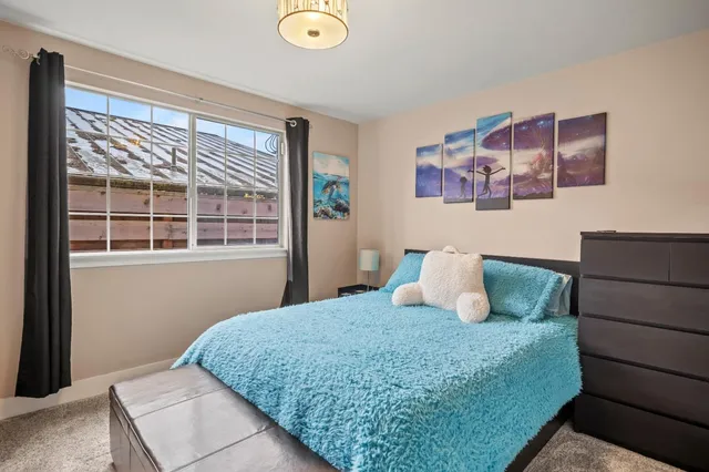 a view of a chairs and table in the balcony