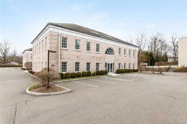 a view of a building with a patio