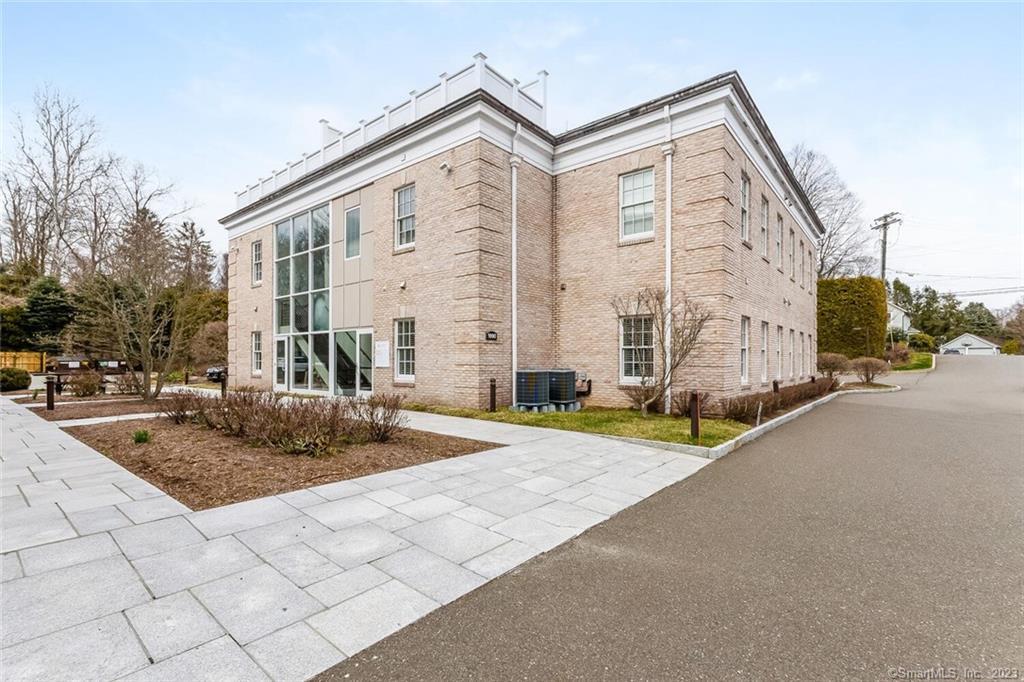 1990 Bronson Road, Unit 2 Fairfield, CT 06824 - Photo 21 of 33 a view of a house with street