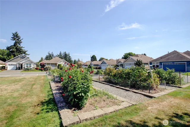 an aerial view of multiple houses with outdoor space