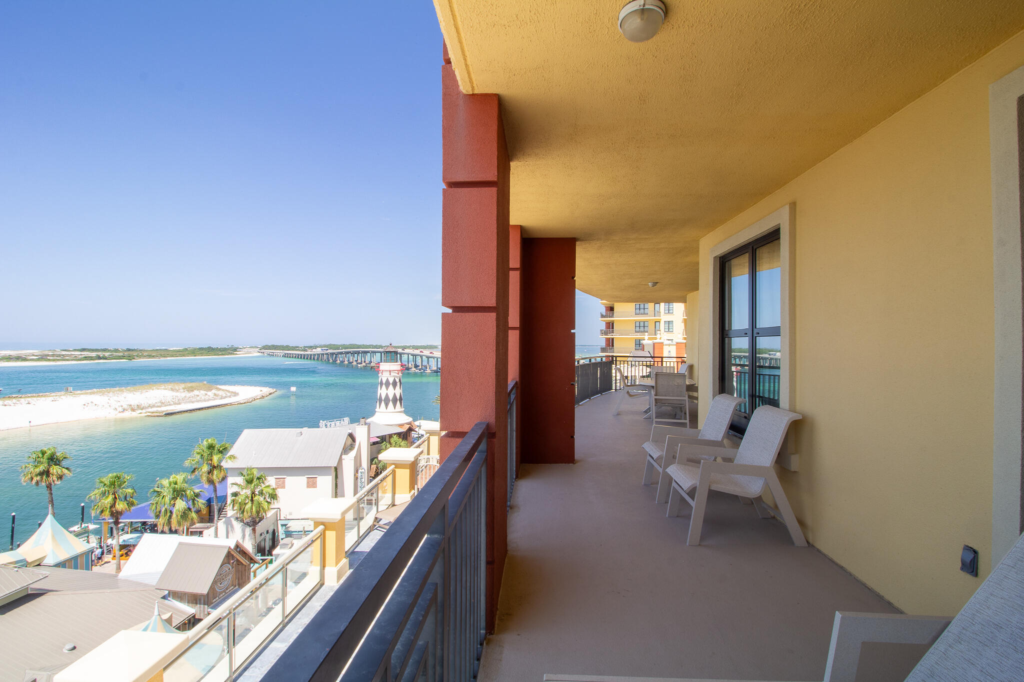 10 Harbor Boulevard, Unit E205H Destin, FL 32541 - Photo 13 of 30 a balcony with an ocean view