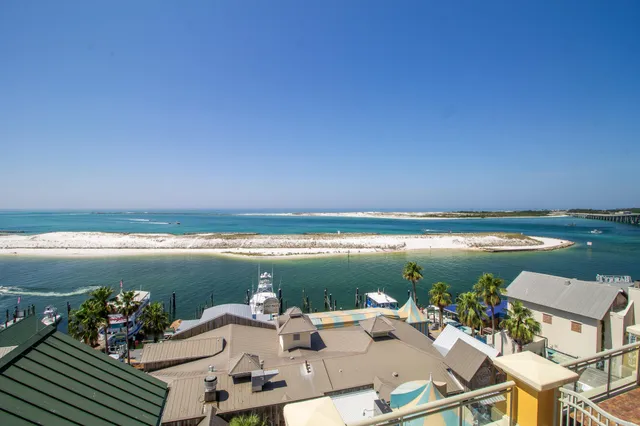 a view of a terrace with chairs and table