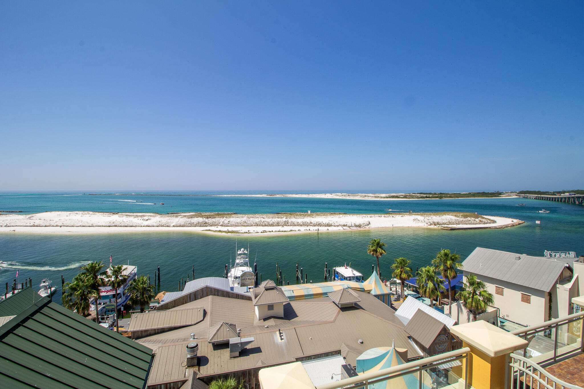10 Harbor Boulevard, Unit E205H Destin, FL 32541 - Photo 7 of 30 a view of a terrace with chairs and table