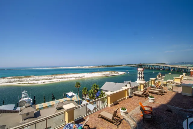 a view of a lake with couches