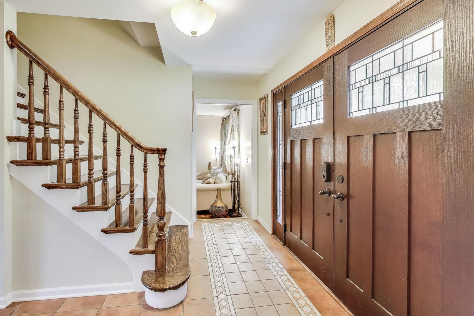 248 Beverly Road Barrington, IL 60010 - Photo 13 of 27 a view of entryway with stairs and a front door