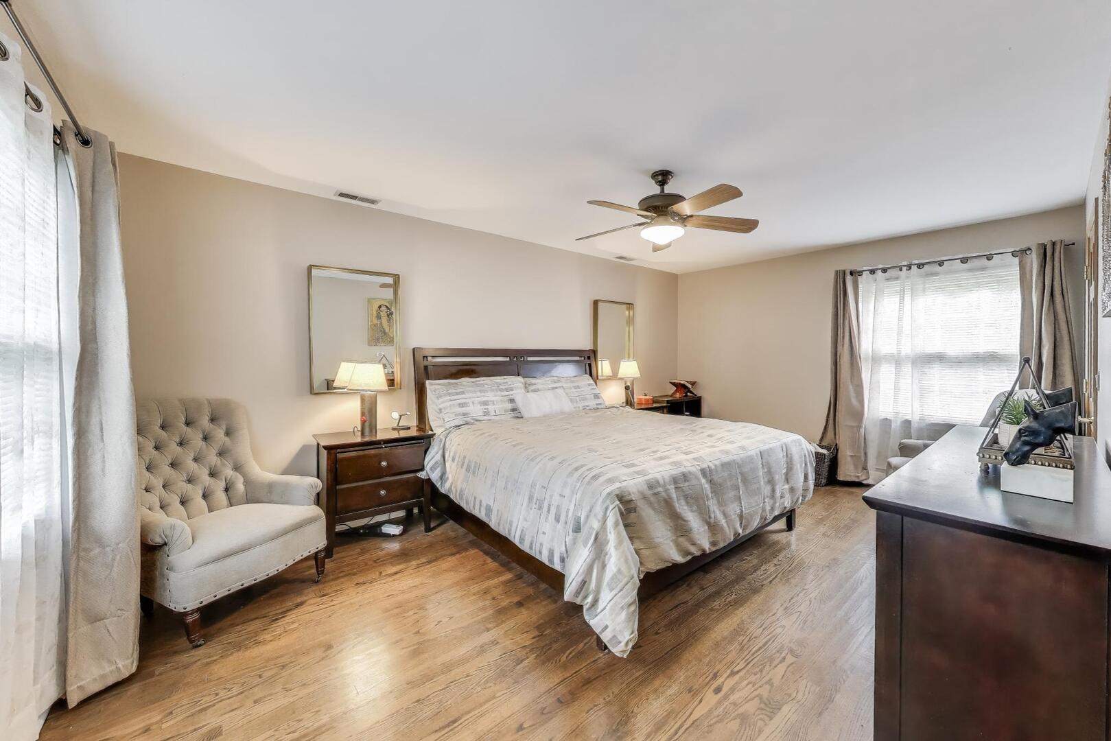 248 Beverly Road Barrington, IL 60010 - Photo 14 of 27 a bedroom with a bed and a chandelier