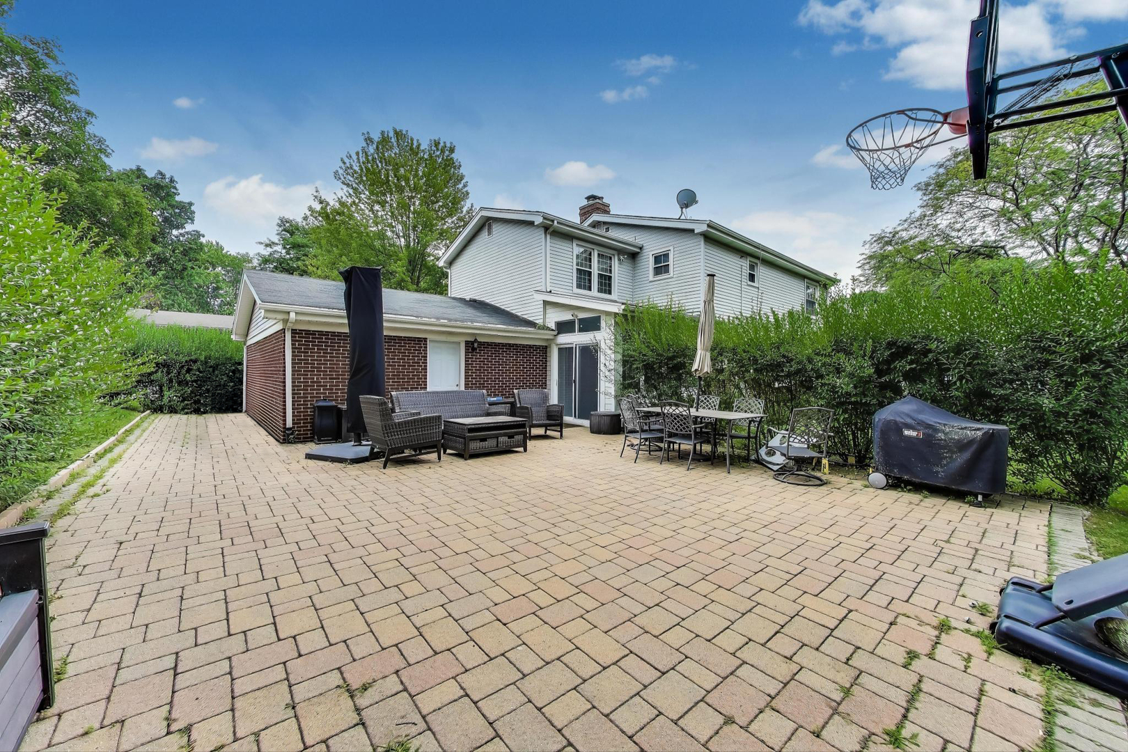 248 Beverly Road Barrington, IL 60010 - Photo 24 of 27 a view of a house with backyard and sitting area
