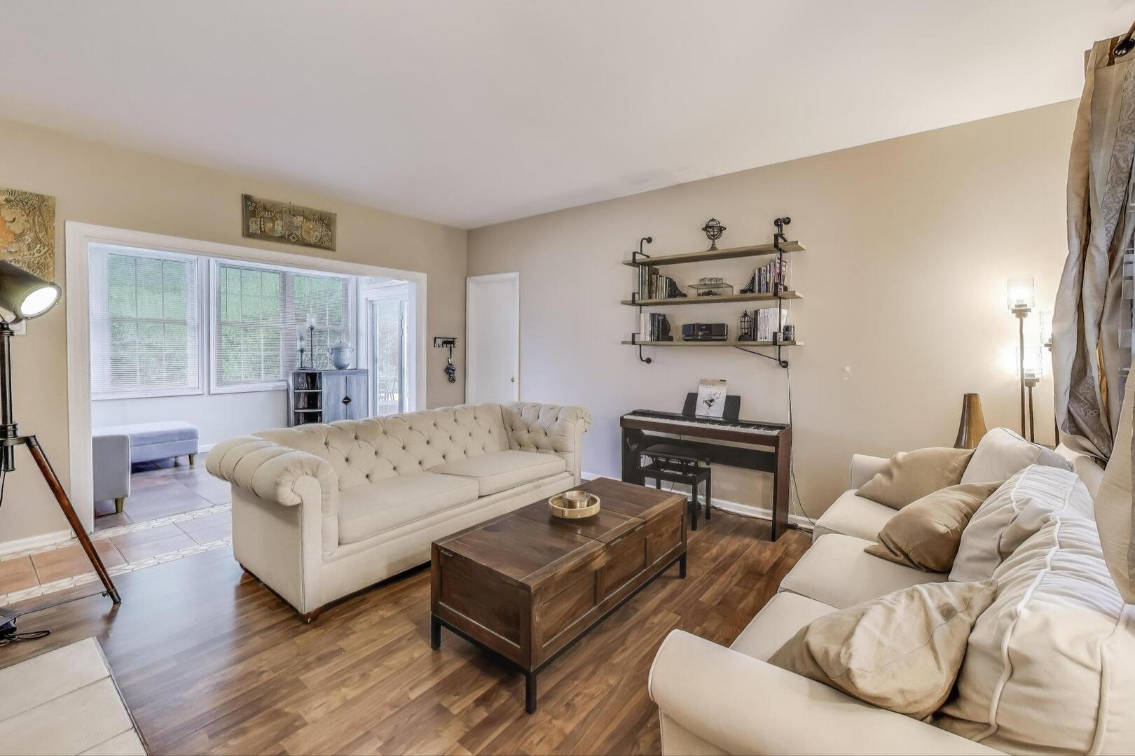 248 Beverly Road Barrington, IL 60010 - Photo 8 of 27 a living room with furniture and wooden floor
