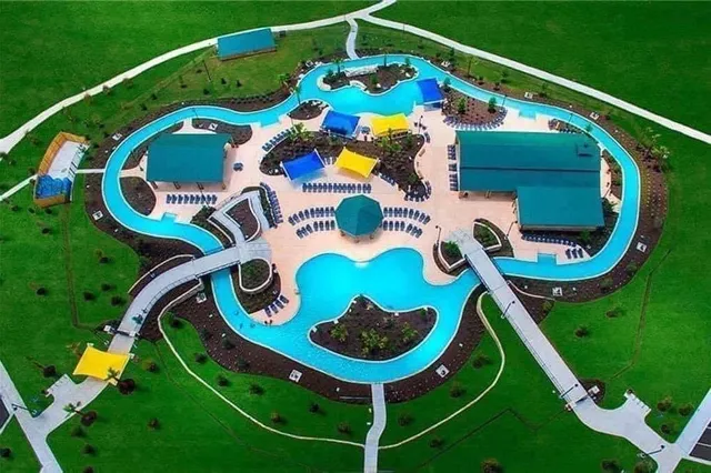 a view of a lake with a house in the background