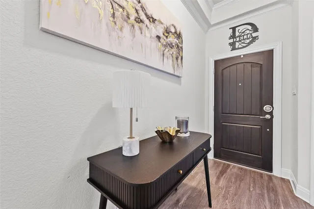 a view of kitchen island with furniture and wooden floor