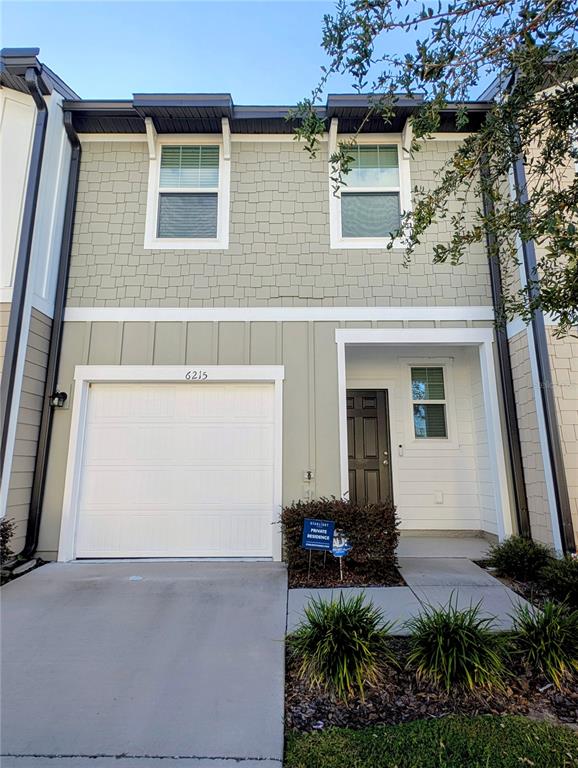 6215 Daerr Rdg Street Zephyrhills, FL 33542 - Photo 27 of 27 a view of house with backyard