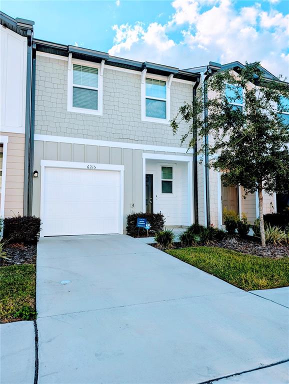 6215 Daerr Rdg Street Zephyrhills, FL 33542 - Photo 6 of 27 a view of a house with backyard and garden