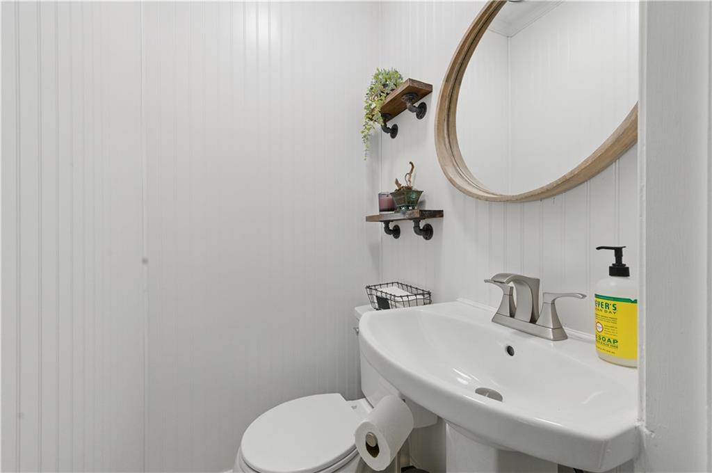 4205 Jeri Lynn Court Tucker, GA 30084 - Photo 17 of 34 a bathroom with a sink and a mirror