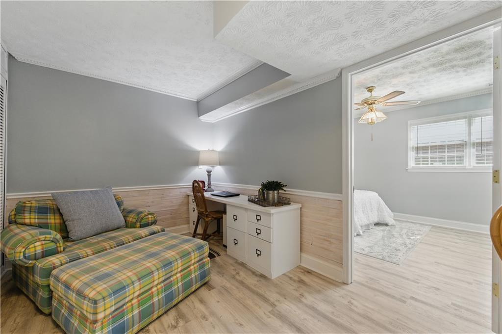 4205 Jeri Lynn Court Tucker, GA 30084 - Photo 20 of 34 a bedroom with a bed and wooden floor