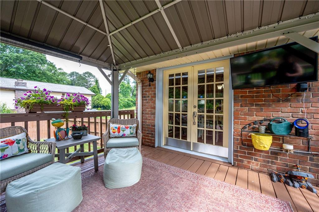 4205 Jeri Lynn Court Tucker, GA 30084 - Photo 29 of 34 a view of a chairs and tables in the patio