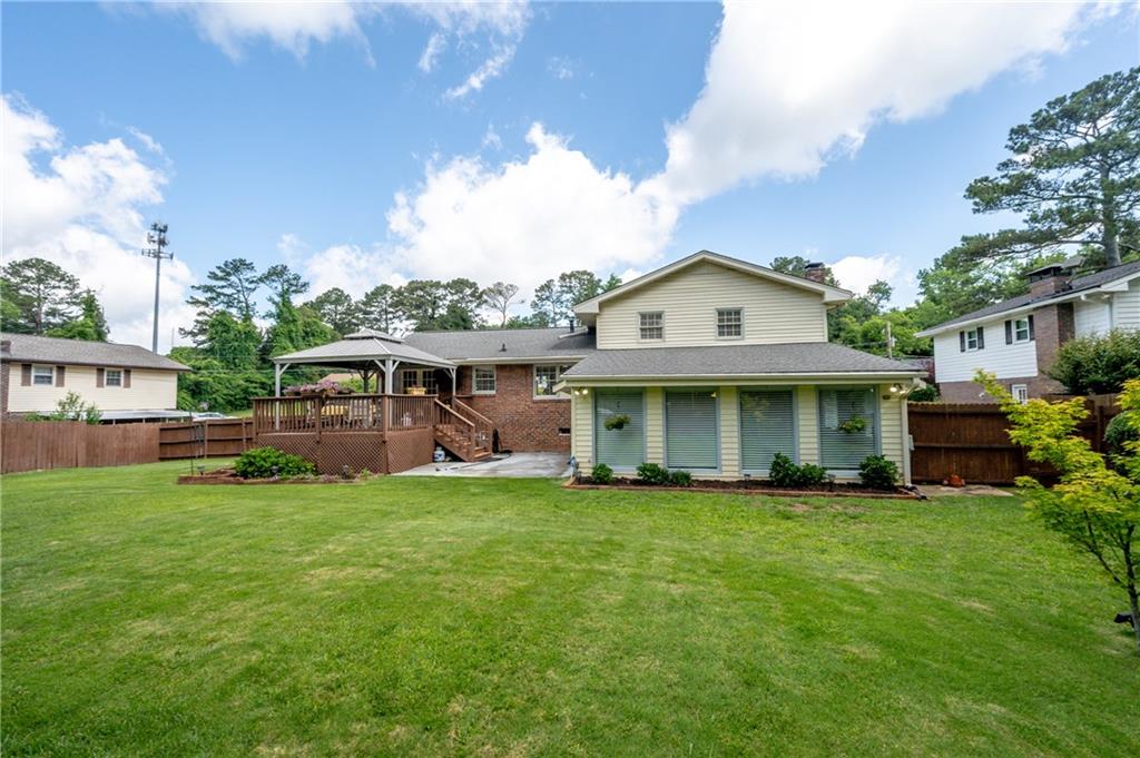 4205 Jeri Lynn Court Tucker, GA 30084 - Photo 34 of 34 a front view of a house with a garden