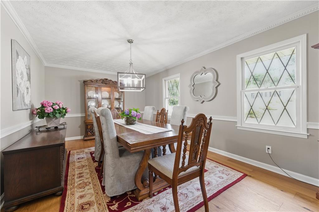 4205 Jeri Lynn Court Tucker, GA 30084 - Photo 4 of 34 a view of a dining room with furniture window and wooden floor