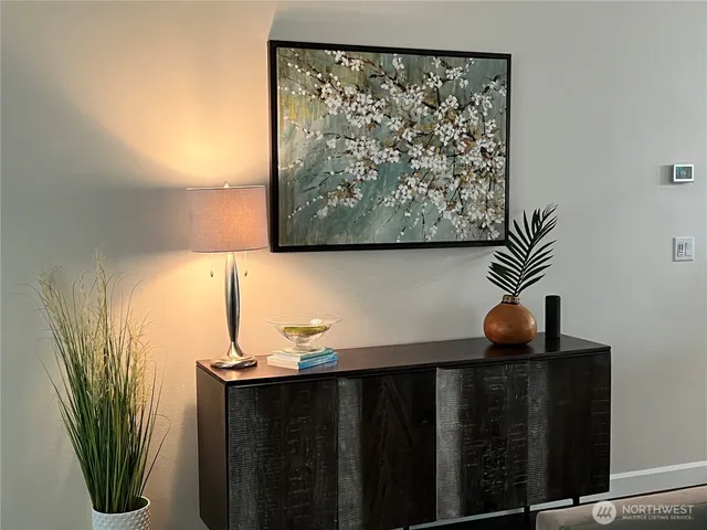 a bathroom with a sink a mirror and cabinets