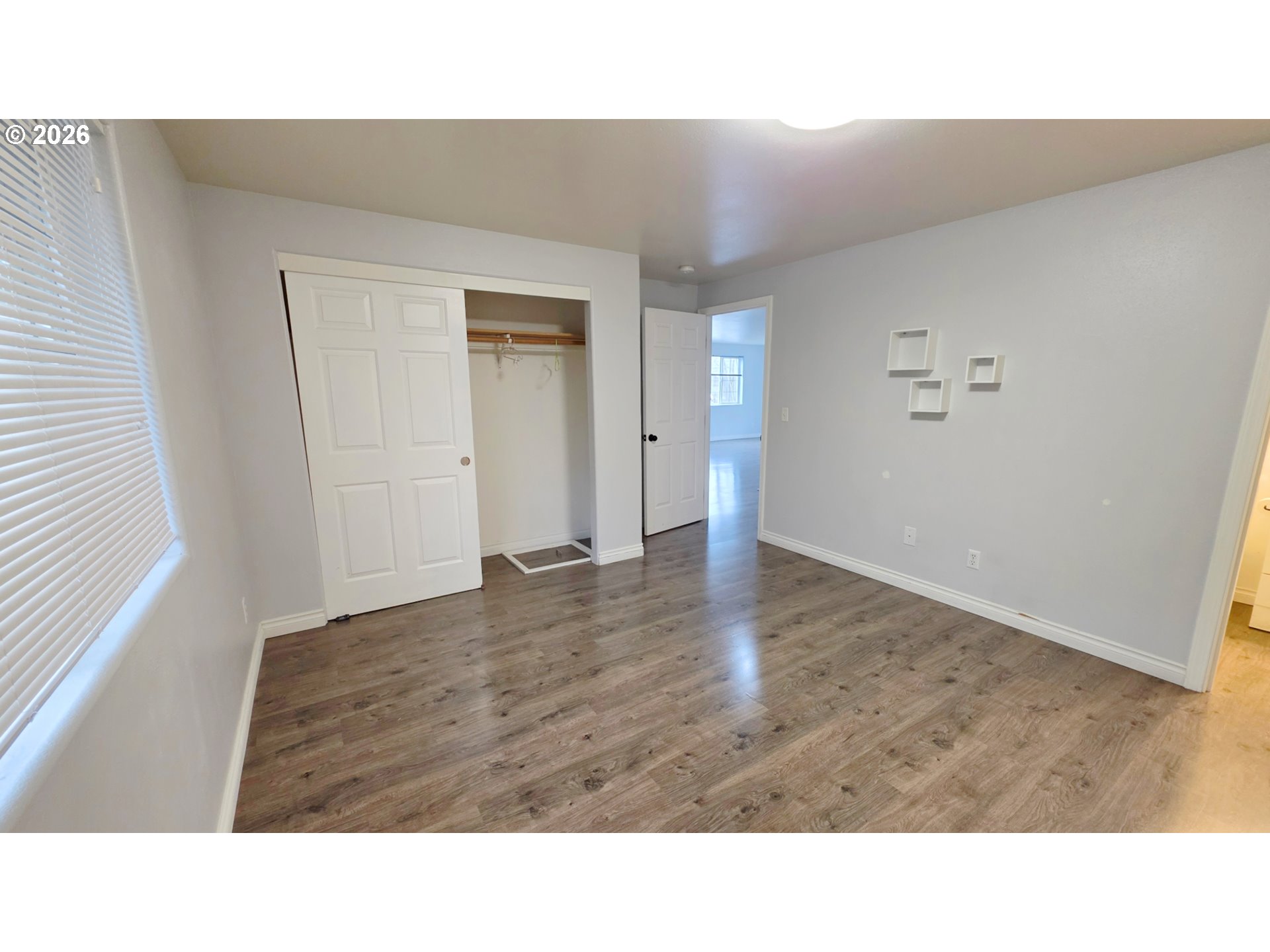 15310 Southeast Stark Street Portland, OR 97233 - Photo 8 of 18 a kitchen with a sink and a refrigerator