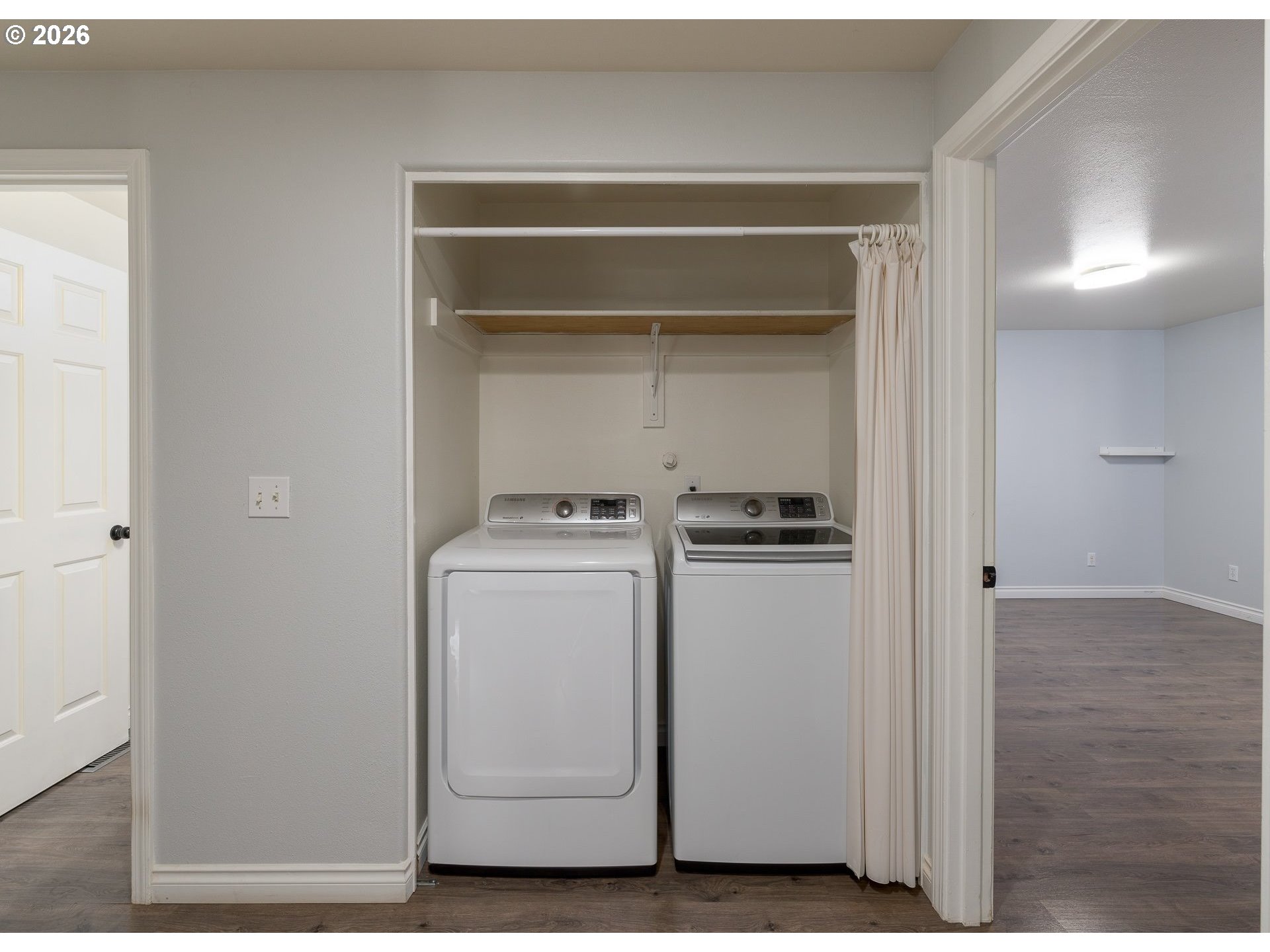 15310 Southeast Stark Street Portland, OR 97233 - Photo 10 of 18 a utility room with dryer and washer