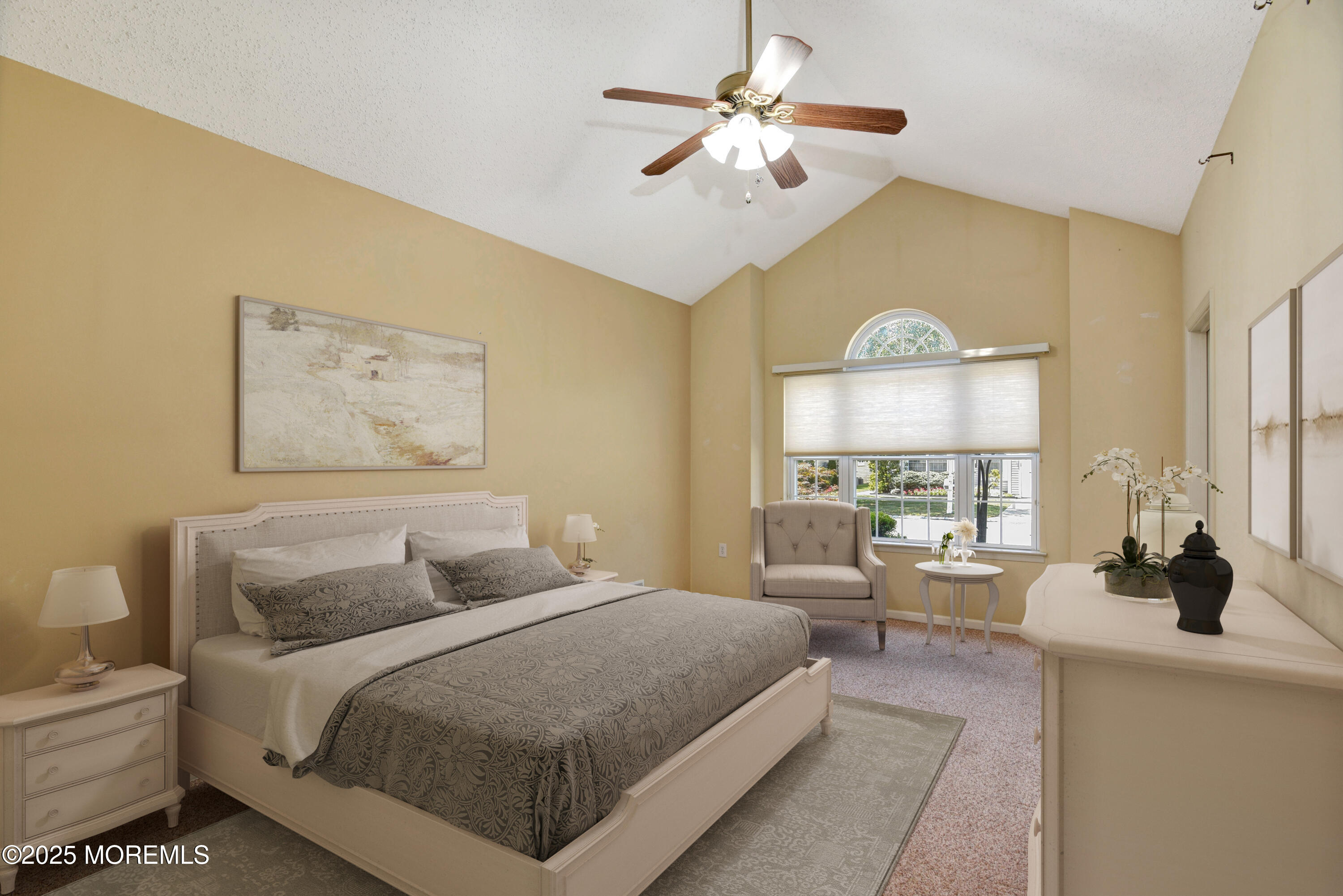 58 Spyglass Drive Jackson, NJ 08527 - Photo 12 of 32 a bedroom with a large bed and a chandelier