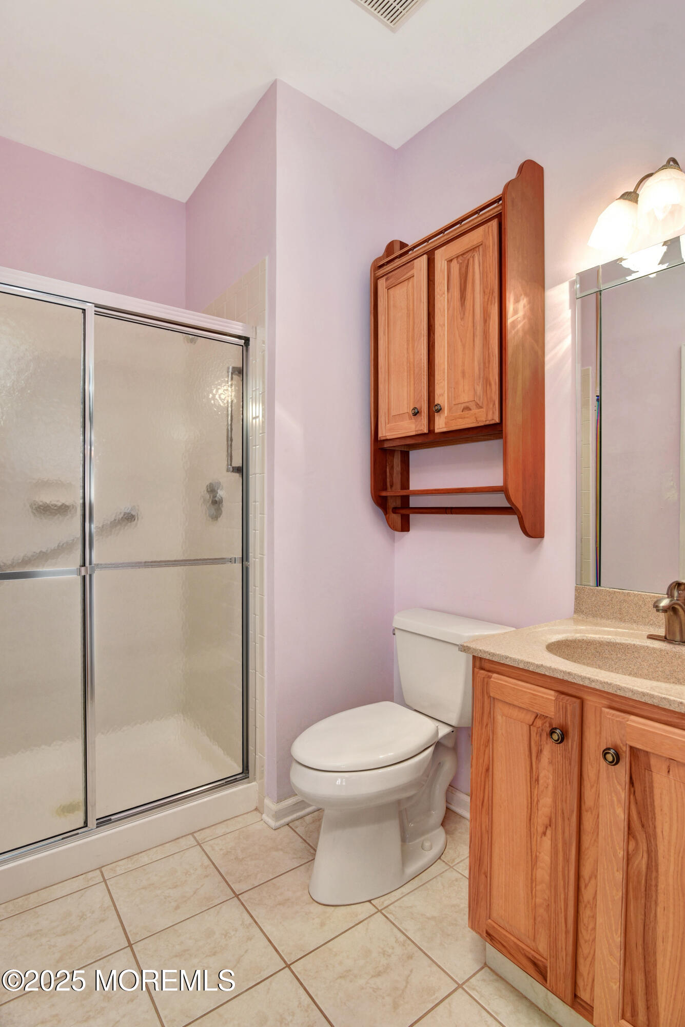 58 Spyglass Drive Jackson, NJ 08527 - Photo 13 of 32 a bathroom with a toilet sink and shower