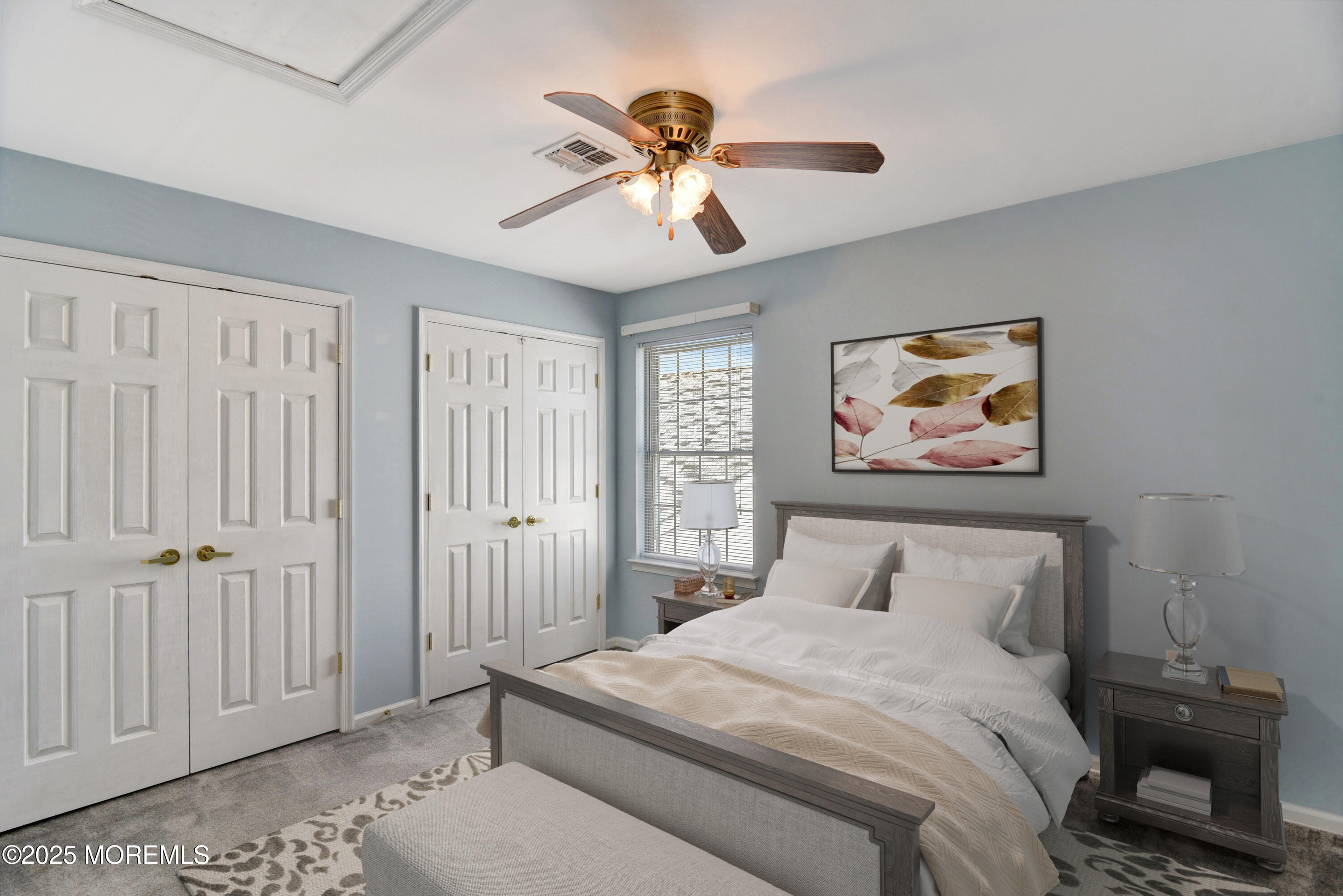 58 Spyglass Drive Jackson, NJ 08527 - Photo 15 of 32 a bedroom with a bed and a chandelier