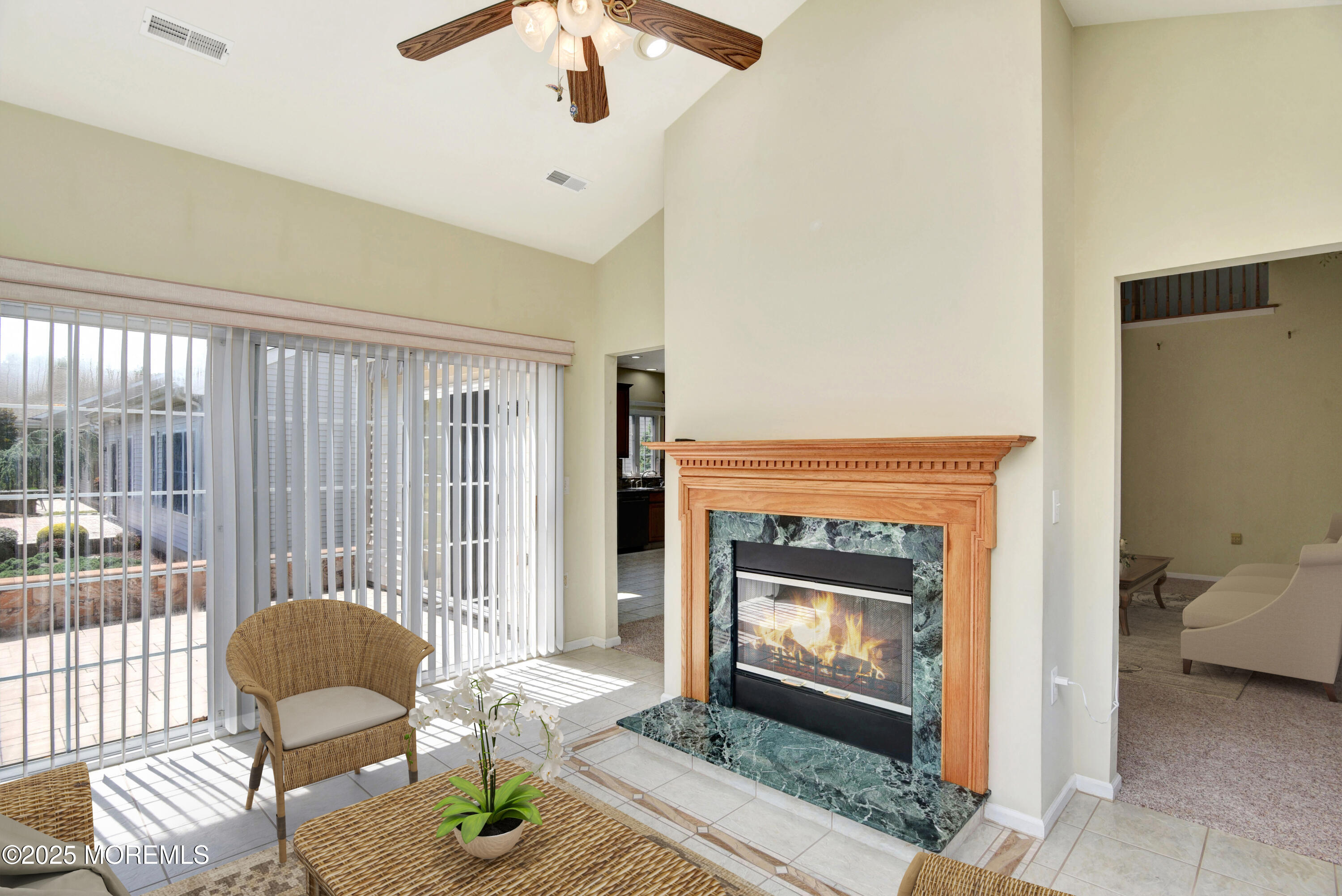 58 Spyglass Drive Jackson, NJ 08527 - Photo 9 of 32 a living room with furniture and a fireplace