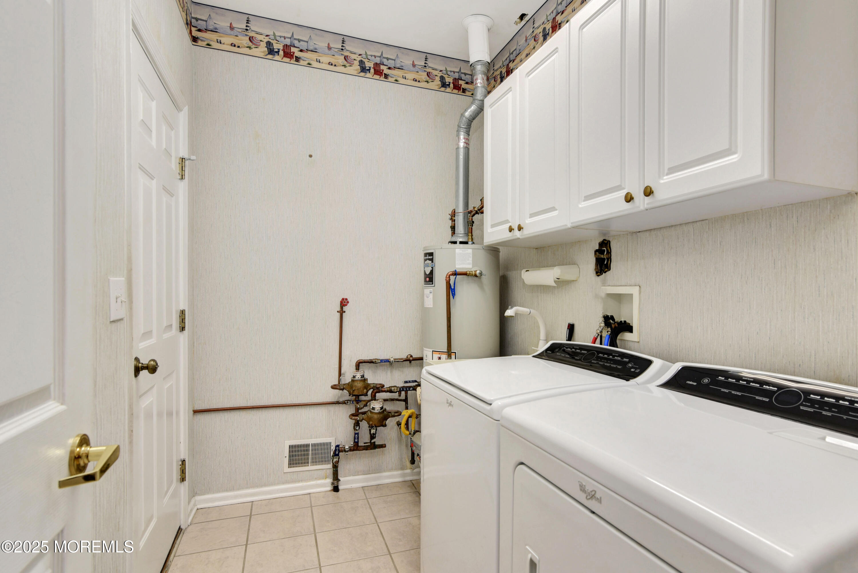 58 Spyglass Drive Jackson, NJ 08527 - Photo 10 of 32 a utility room with dryer and washer