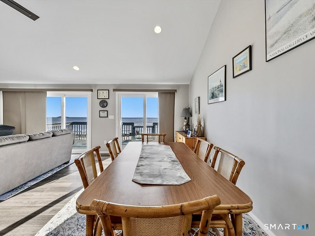 75 Shore Road Clinton, CT 06413 - Photo 14 of 40 a view of a dining room with furniture