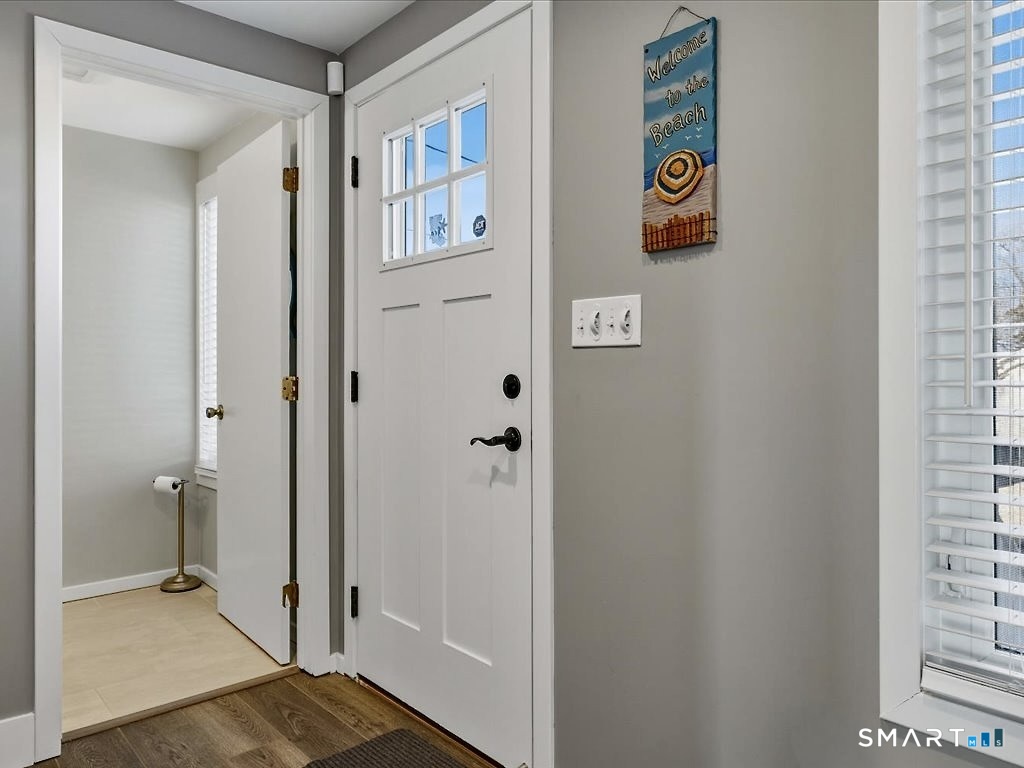 75 Shore Road Clinton, CT 06413 - Photo 31 of 40 a bathroom with a shower and a toilet