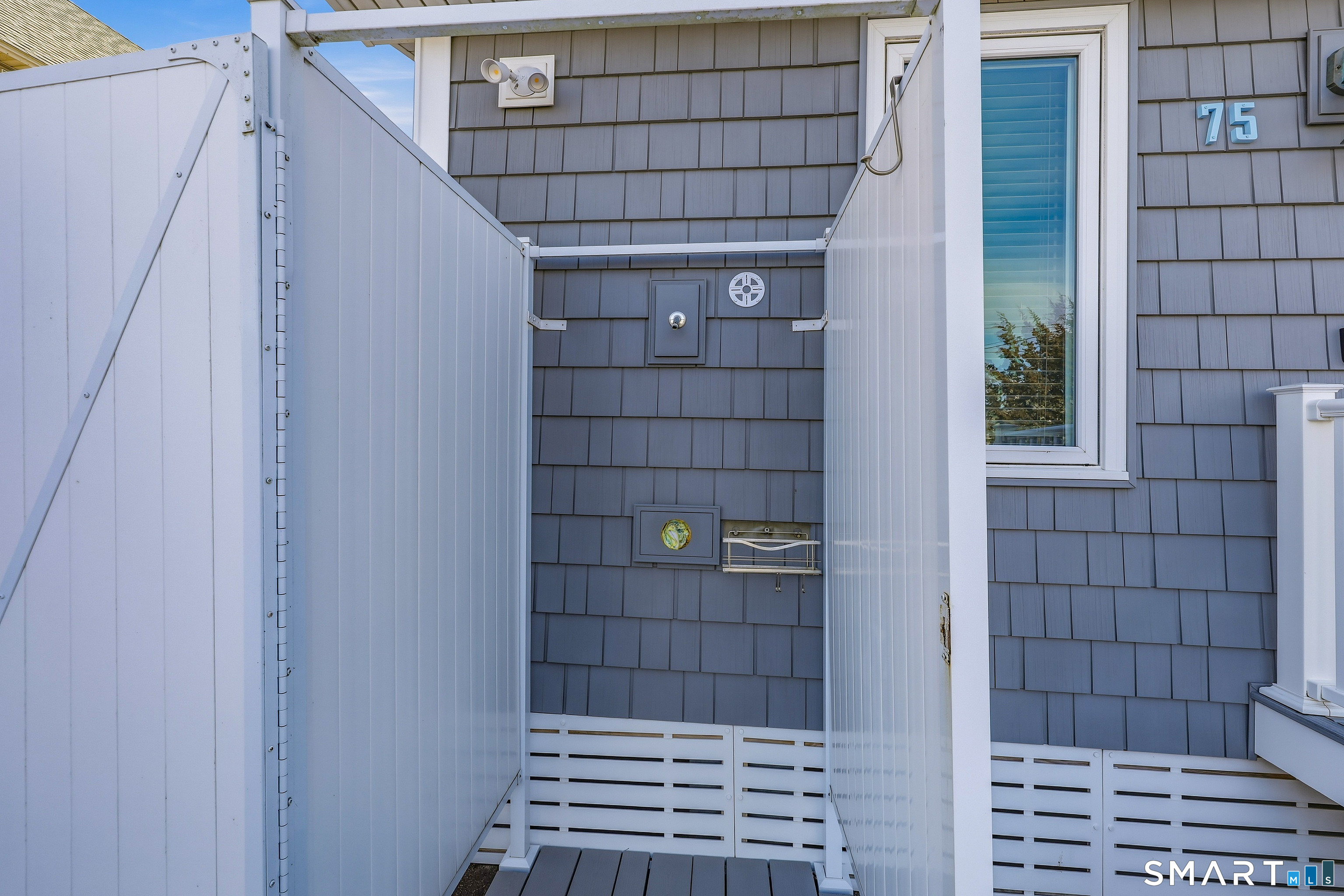 75 Shore Road Clinton, CT 06413 - Photo 34 of 40 a view of outdoor space and wooden deck
