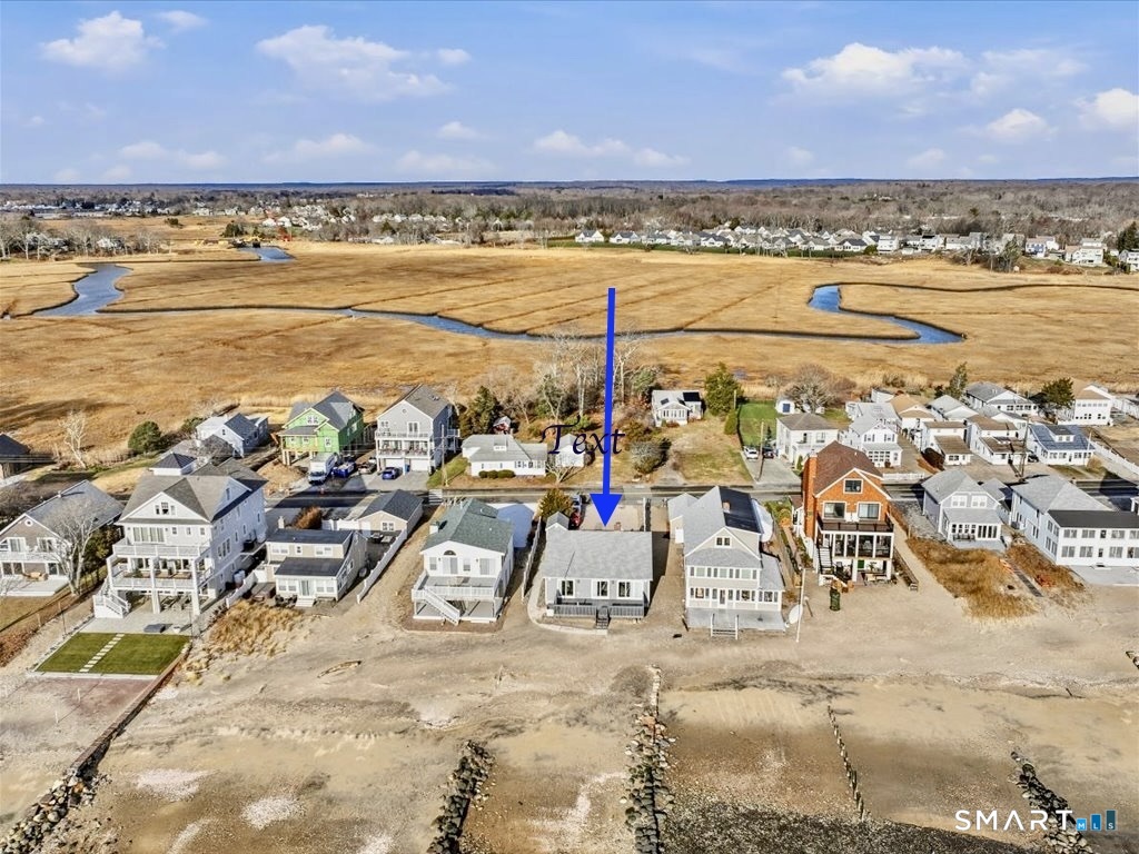 75 Shore Road Clinton, CT 06413 - Photo 35 of 40 a view of an ocean and beach