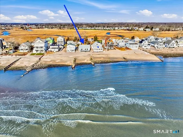 a view of an ocean and a building
