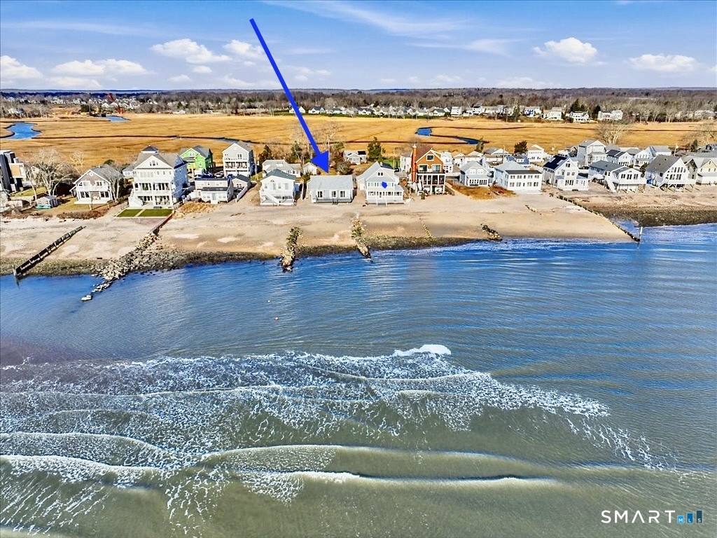 75 Shore Road Clinton, CT 06413 - Photo 36 of 40 a view of a ocean with city