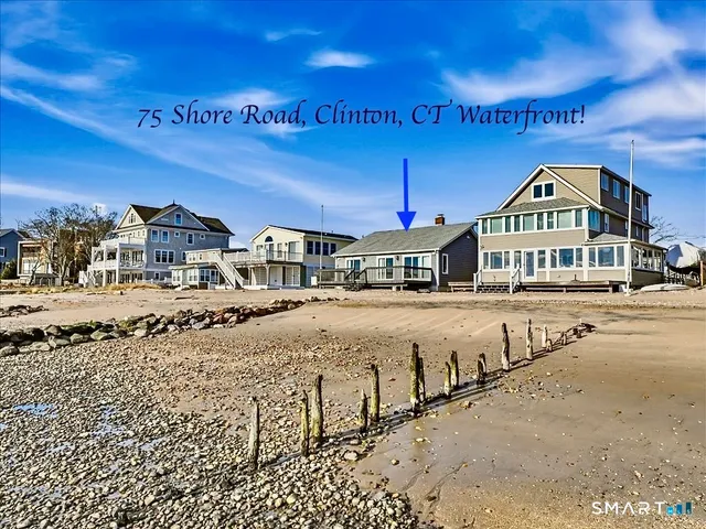a view of a balcony with an outdoor seating