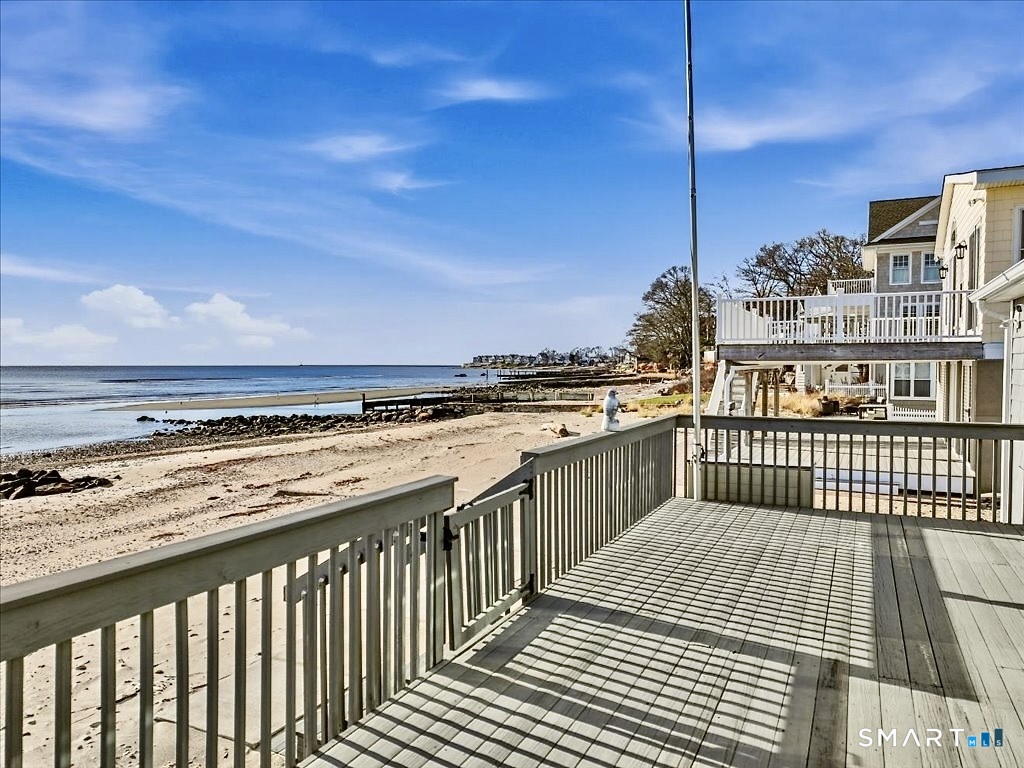 75 Shore Road Clinton, CT 06413 - Photo 8 of 40 a view of a balcony with an outdoor seating