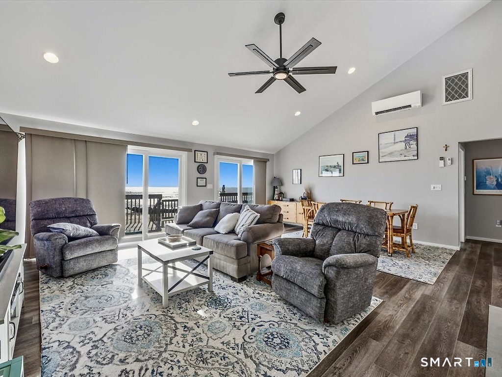 75 Shore Road Clinton, CT 06413 - Photo 10 of 40 a living room with furniture and a ceiling fan