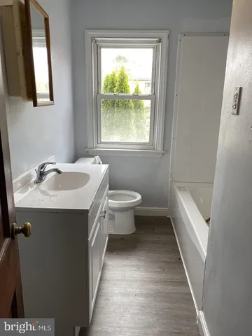 a bathroom with a sink and a toilet