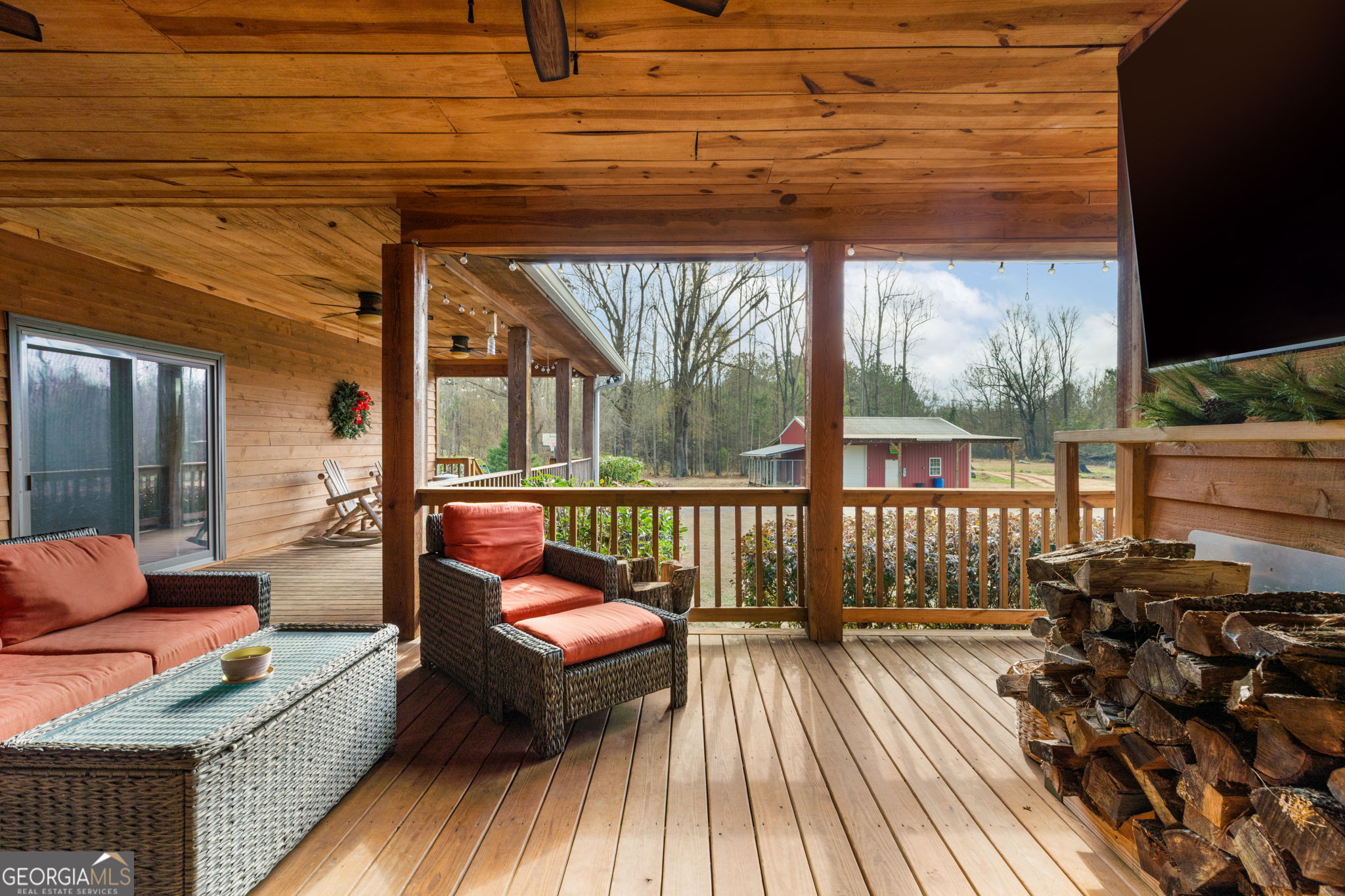 2770 Jones Road Sandersville, GA 31082 - Photo 50 of 80 a balcony with wooden floor and outdoor seating