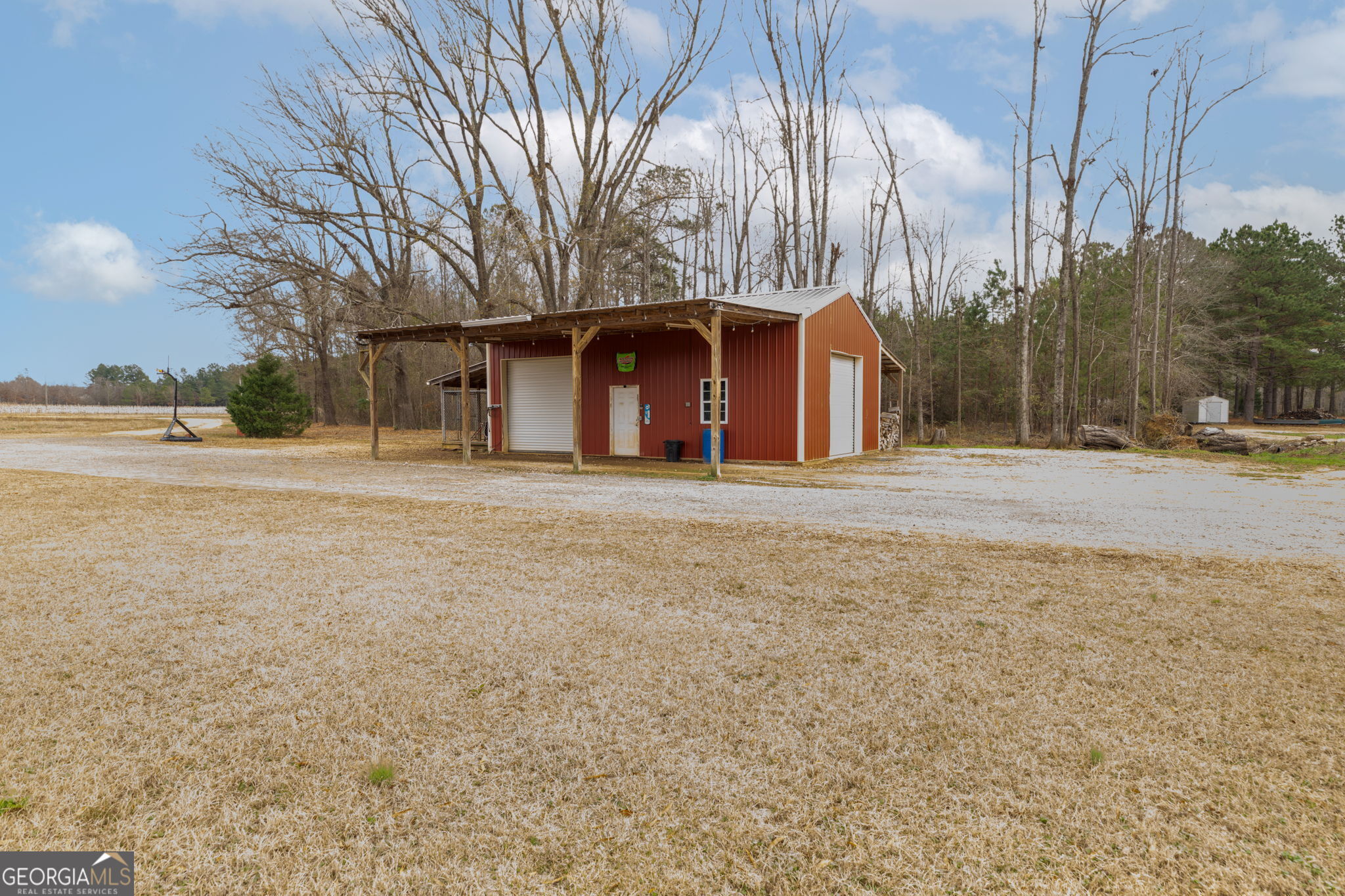 2770 Jones Road Sandersville, GA 31082 - Photo 57 of 80 a front view of a house with a yard