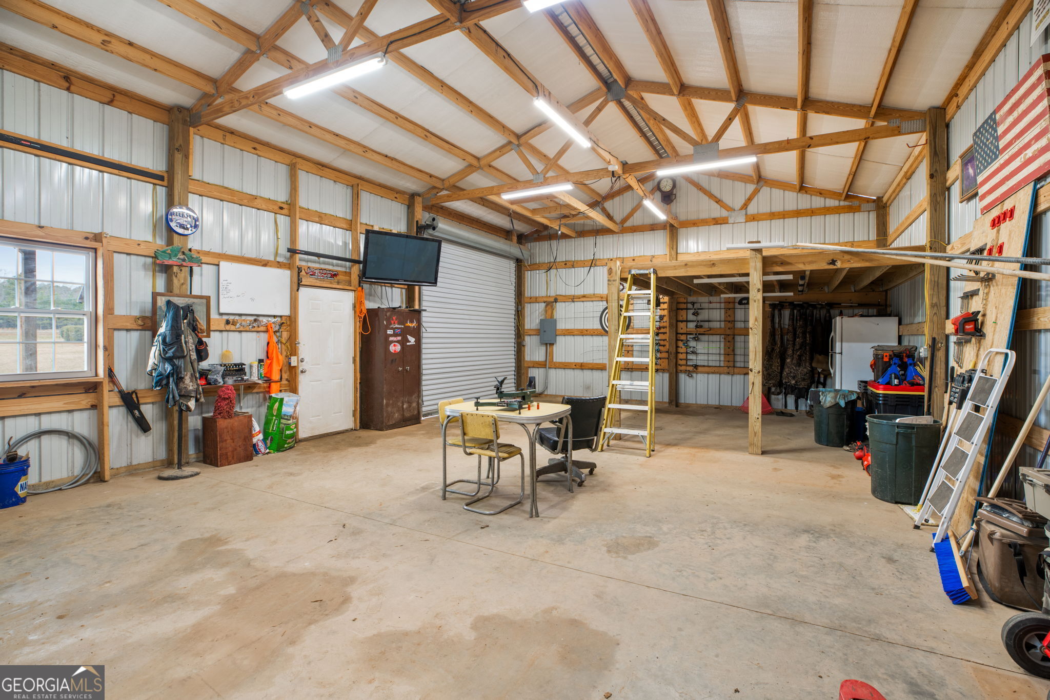 2770 Jones Road Sandersville, GA 31082 - Photo 61 of 80 a view of a storage room with a lot of stuff